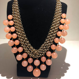 Lovely light coral colored necklace!